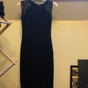 Black, tight, midi length dress